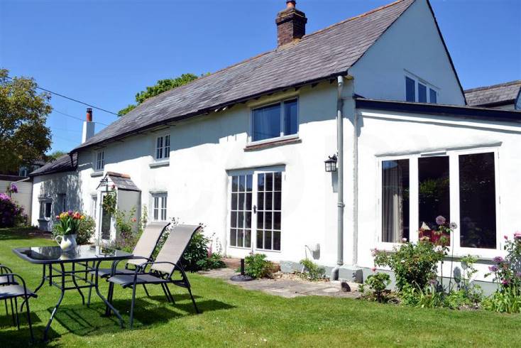 Click here for more about Walnut Tree Cottage
